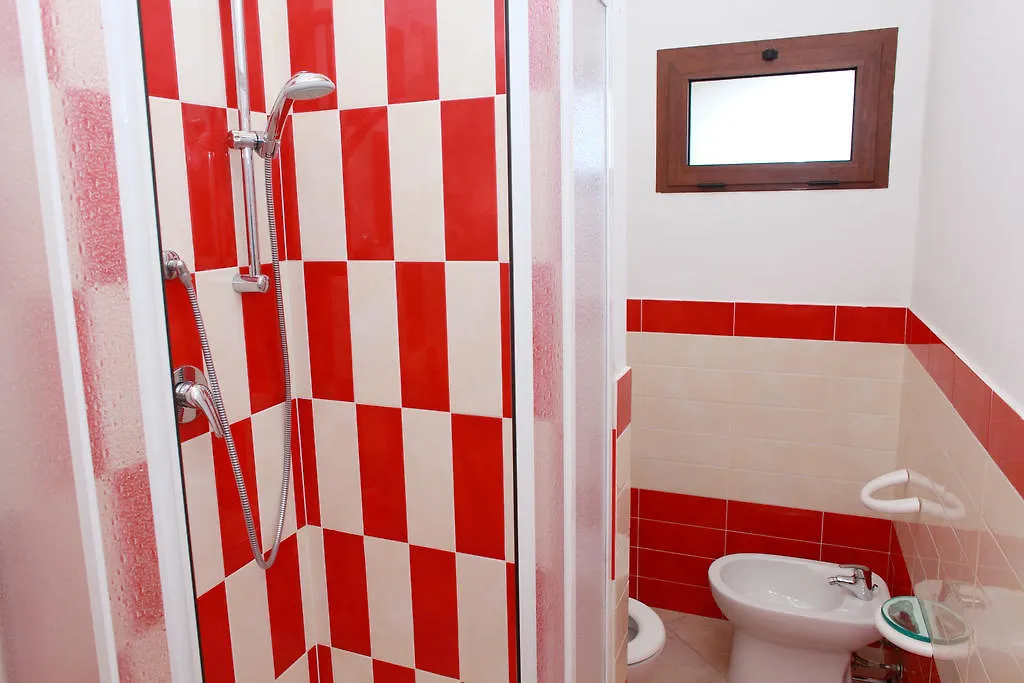**** Aparthotel Villa Rosanna Isola Rossa Itálie
